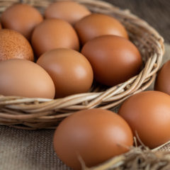 Eggs on the sacks, hemp on the wooden and straw. Selective focus