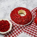 Salad Garnet bracelet. Vegetable salad with pomegranate seeds wi